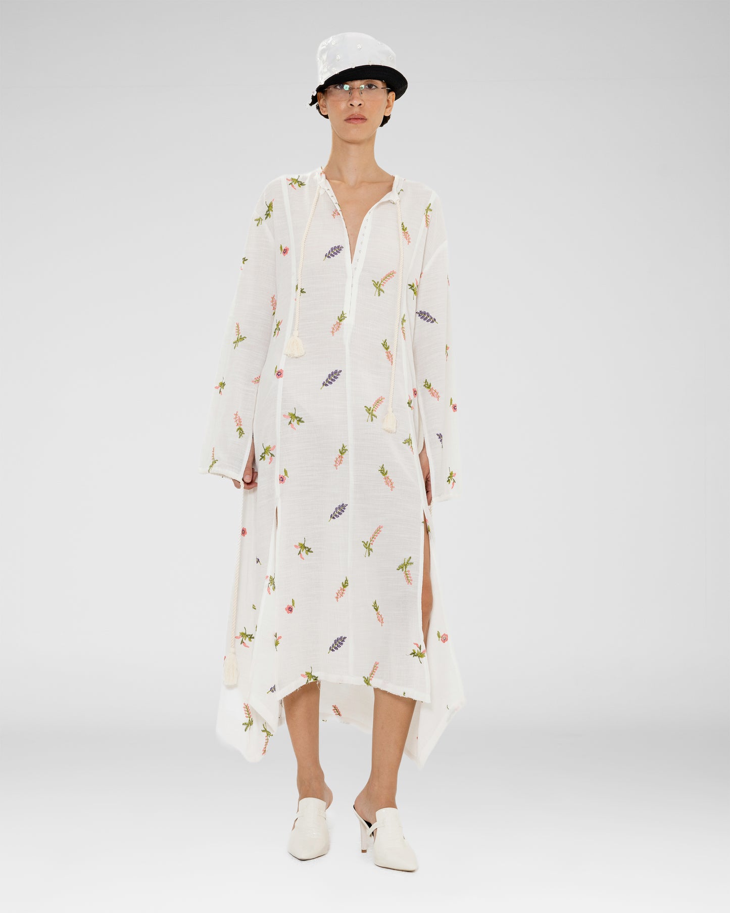 A white sheer knit maxi dress