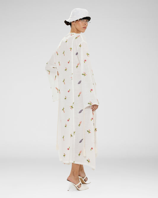 A white sheer knit maxi dress