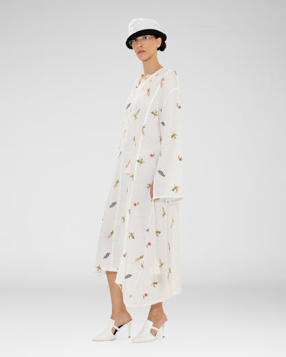A white sheer knit maxi dress